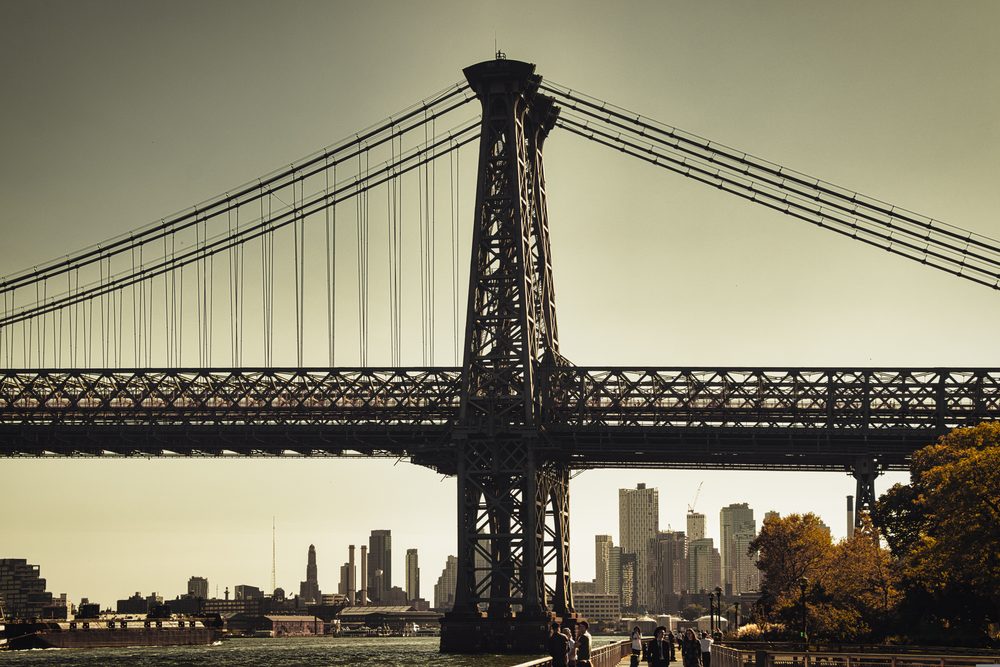 The Williamsburg Bridge over the East River at golden hour